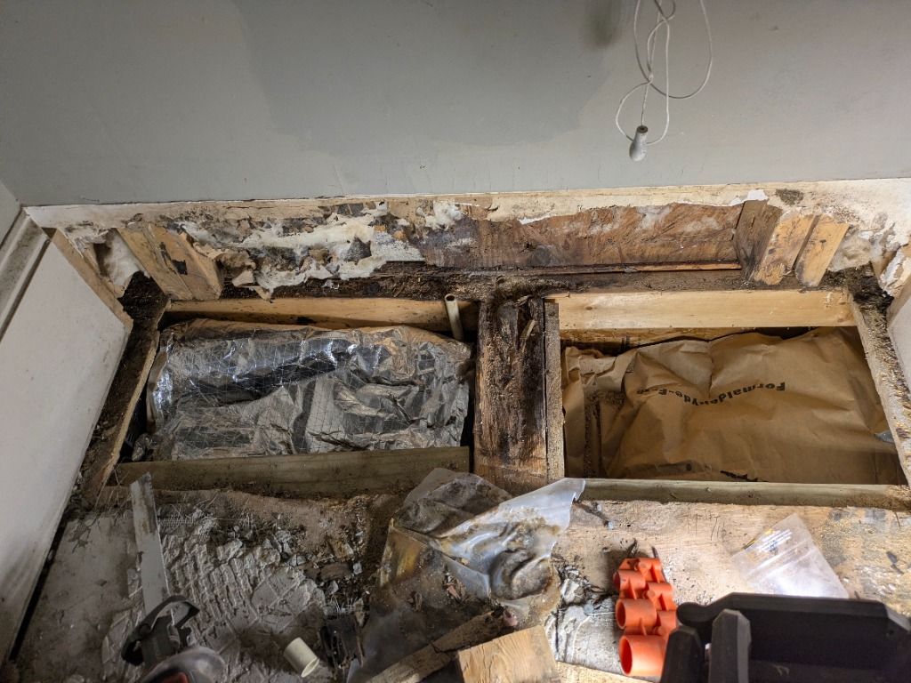 Rotted floor joists under bathroom